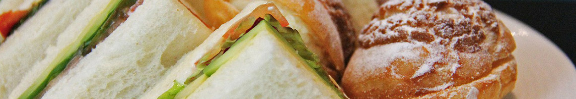 Eating Sandwich at Subs N Grub restaurant in Cypress, CA.